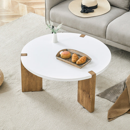 33.4-inch Diameter Minimalist Circular MDF Material Coffee Table, A Stable And Practical Choice. The Unique Embedded Design And The Support Of Three Table Legs Make The Coffee Table Structure Stable.